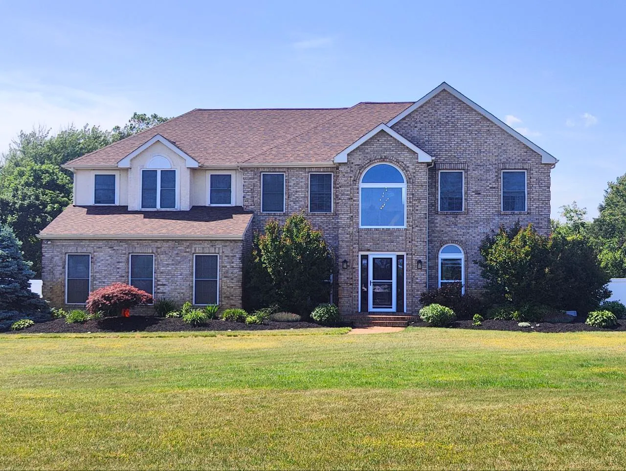 Brick Colonial, Two-Story Arch