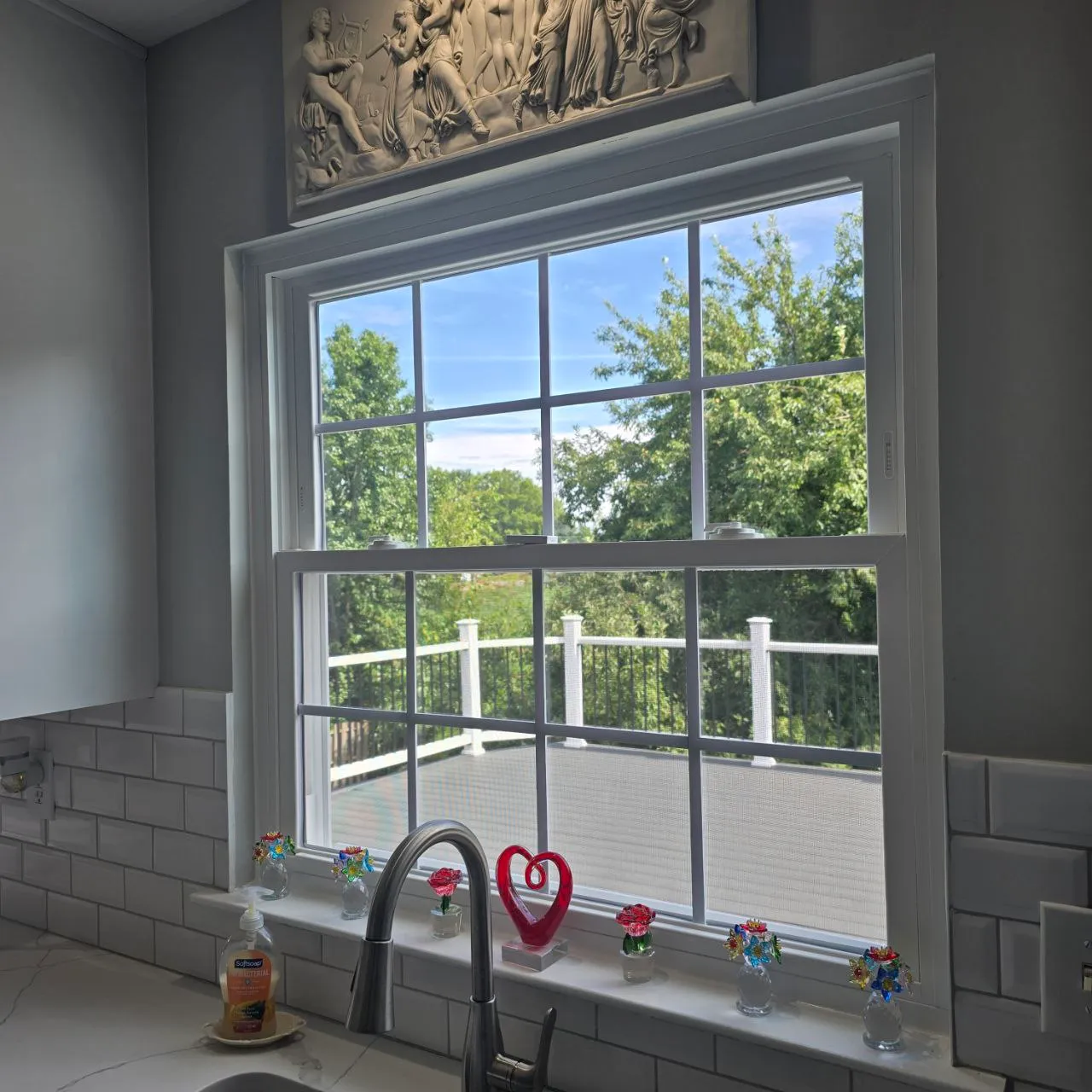 Bright kitchen with a new gridded window over the sink